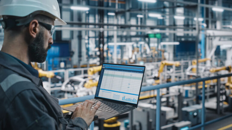 Worker with AI powered laptop