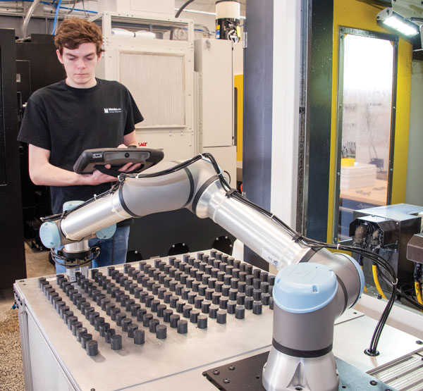 Co-Founder James Cerven setting up Robot